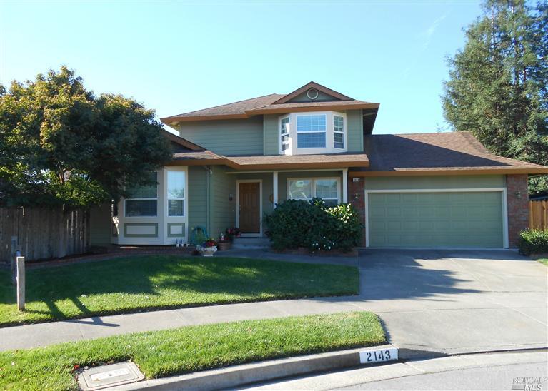 2143 Passado Court Santa Rosa, CA 95403 - Photo 1 of 1 a front view of a house with a yard and garage