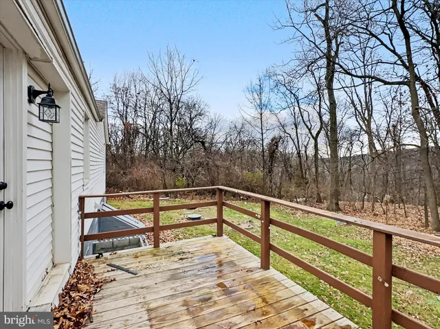 a view of outdoor space with seating and trees