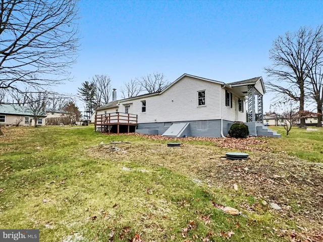a fire hydrant in the middle of a field