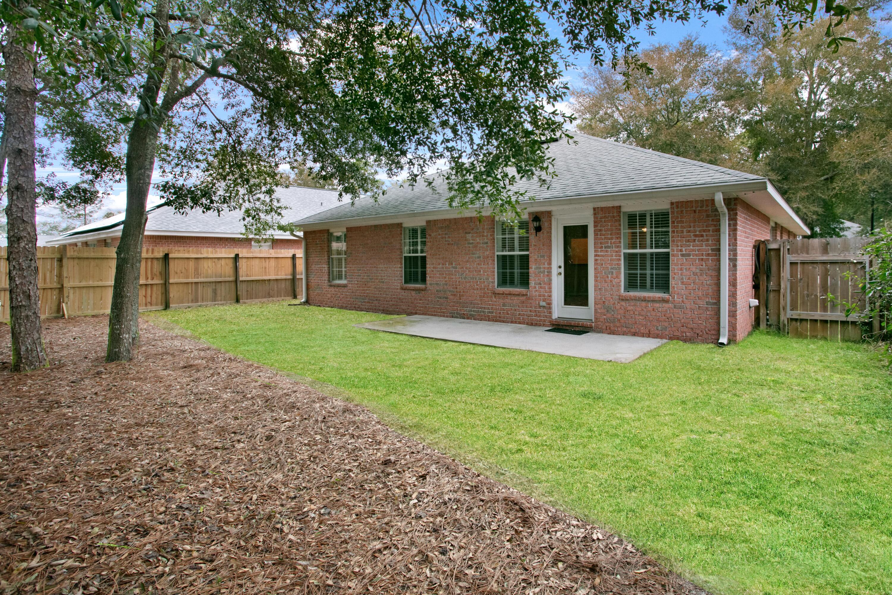 145 Bayou Landing Road Miramar Beach, FL 32550 - Photo 11 of 28 front view of a house with yard