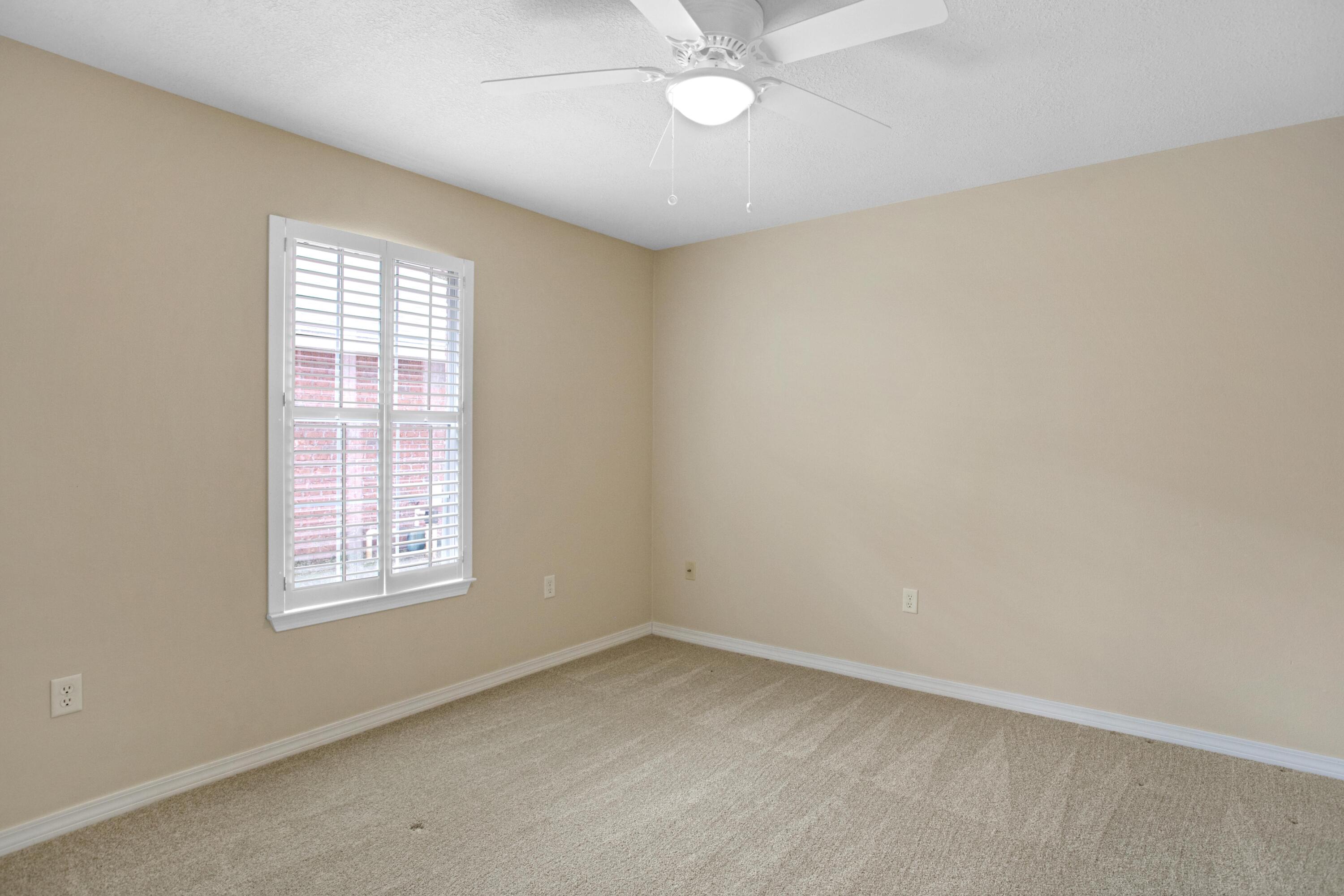 145 Bayou Landing Road Miramar Beach, FL 32550 - Photo 24 of 28 an empty room with a window