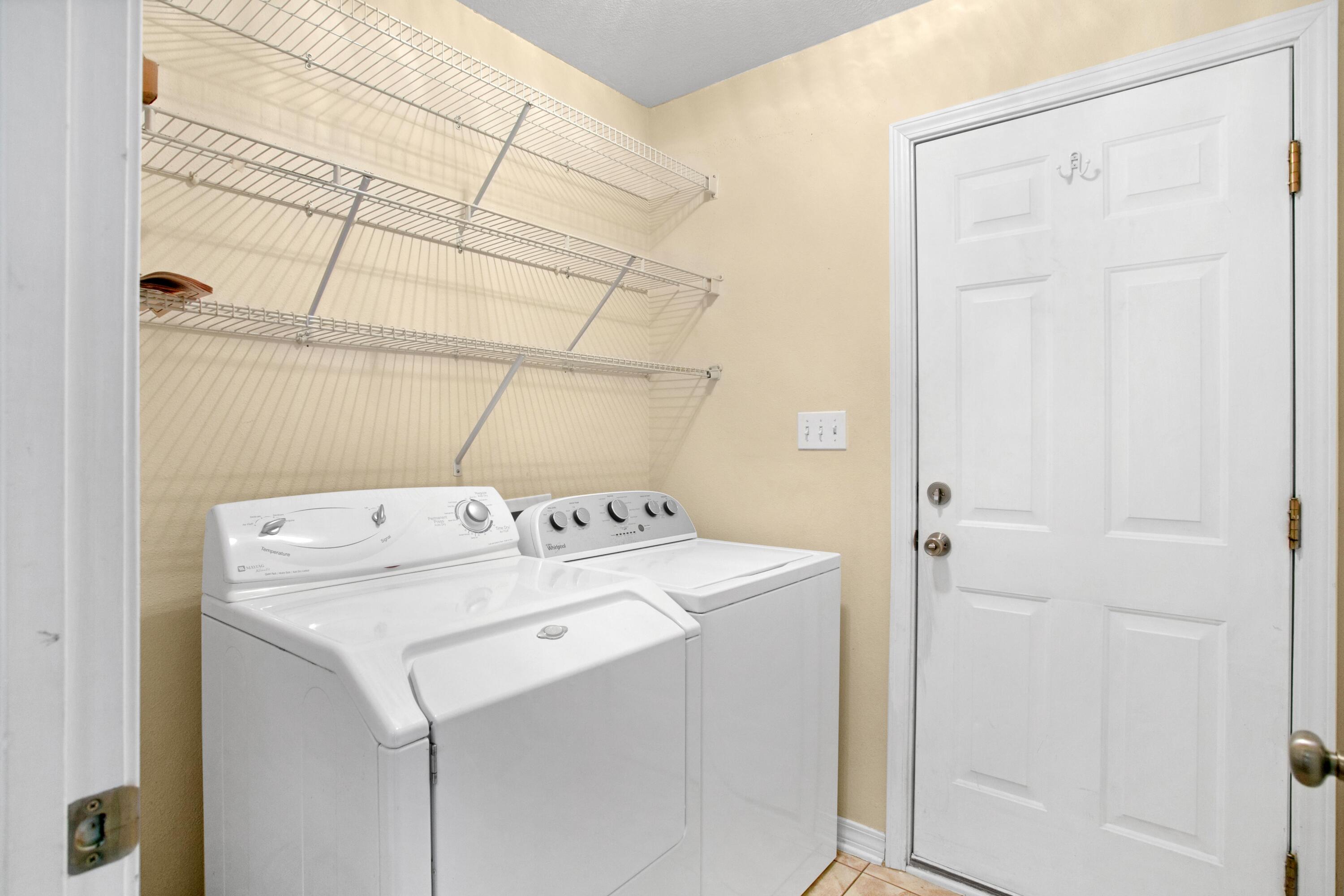 145 Bayou Landing Road Miramar Beach, FL 32550 - Photo 26 of 28 a utility room with dryer and washer