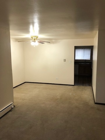 2218 West Nichols Road, Unit C Arlington Heights, IL 60004 - Photo 4 of 10 a view of an empty room