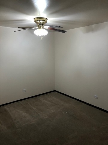 2218 West Nichols Road, Unit C Arlington Heights, IL 60004 - Photo 5 of 10 a view of a room with window