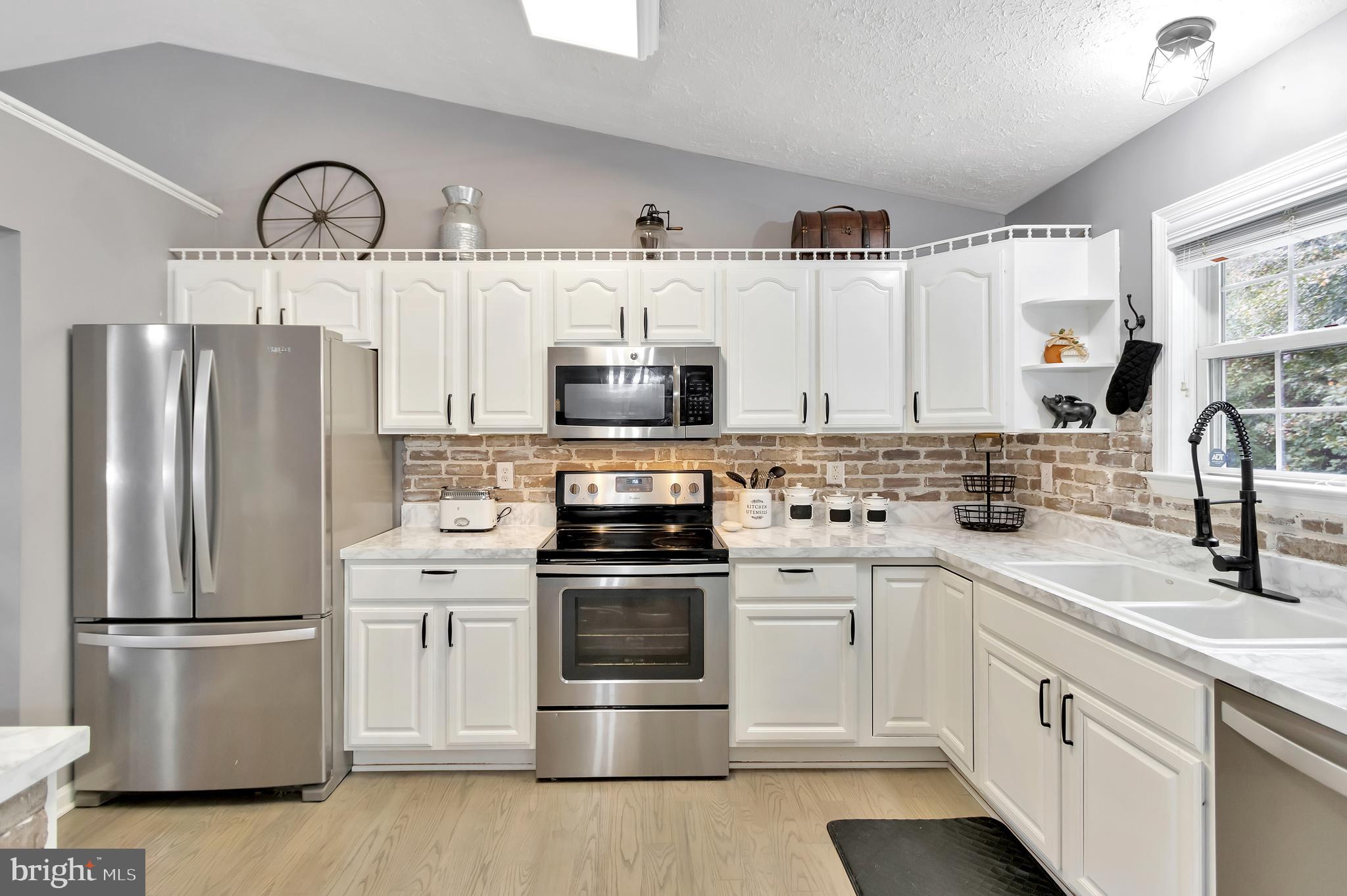 912 Crystal Rock Road Lusby, MD 20657 - Photo 2 of 27 Kitchen view from dining area