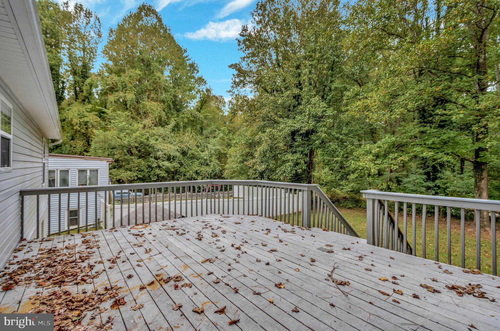 912 Crystal Rock Road Lusby, MD 20657 - Photo 25 of 27 Walkout deck from kitchen