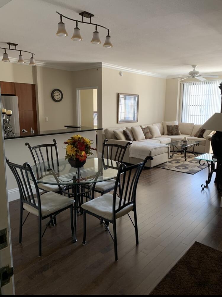 233 South Federal Highway, Unit 321 Boca Raton, FL 33432 - Photo 3 of 40 a living room with furniture and a window