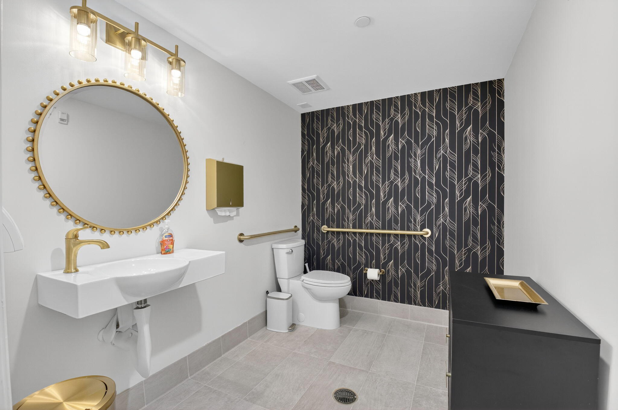 233 South Federal Highway, Unit 321 Boca Raton, FL 33432 - Photo 33 of 40 a bathroom with a sink a toilet and a mirror