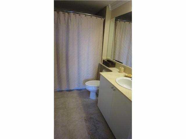 233 South Federal Highway, Unit 321 Boca Raton, FL 33432 - Photo 7 of 40 a bathroom with a sink a toilet and shower