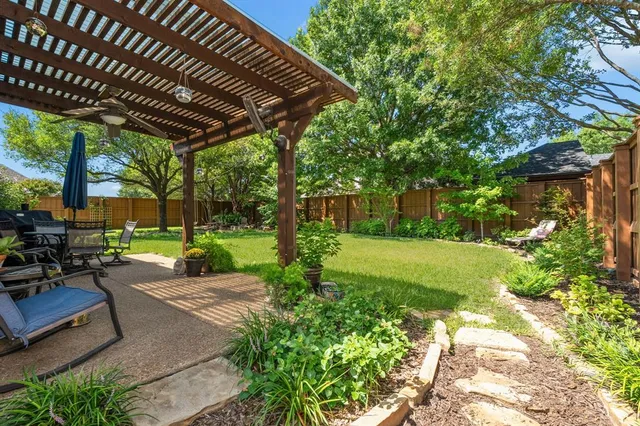 a room with furniture pool table and chairs