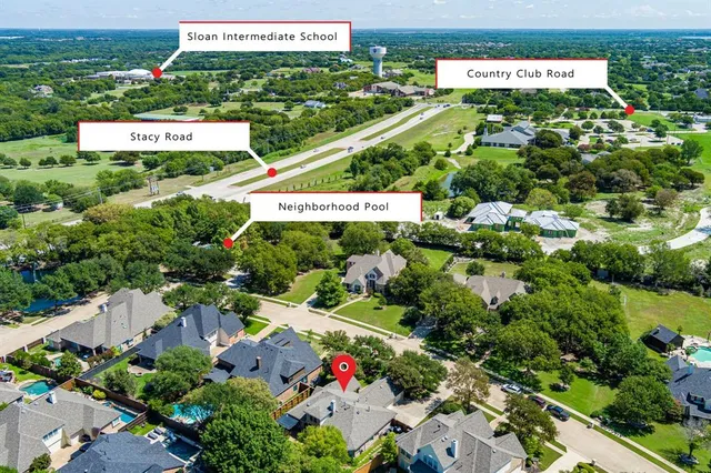 an aerial view of a house with a garden