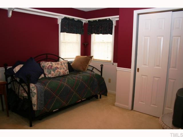 3520 Singleleaf Lane Raleigh, NC 27616 - Photo 9 of 12 a bedroom with a bed and a window