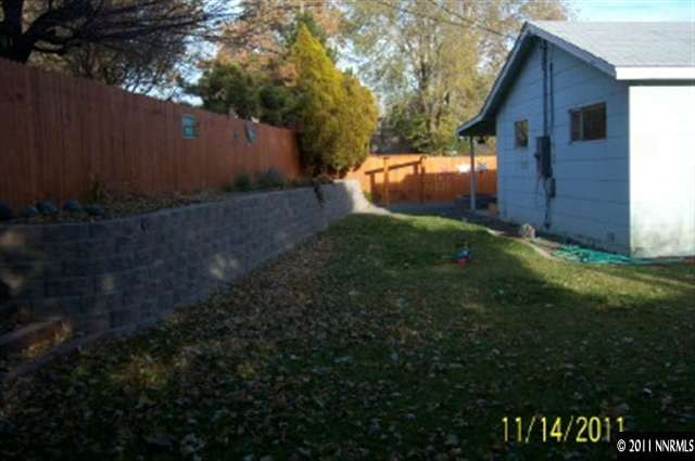 40 Butte Place Reno, NV 89503 - Photo 11 of 13 a backyard of a house with lots of green space