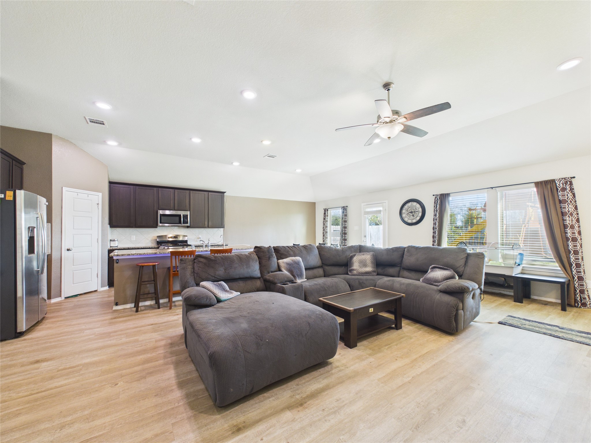 1237 Steed Bluff Drive Alvin, TX 77511 - Photo 11 of 50 a living room with furniture and a wooden floor