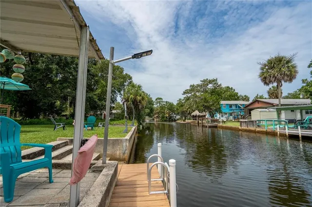 a view of a lake with a deck and a lake view