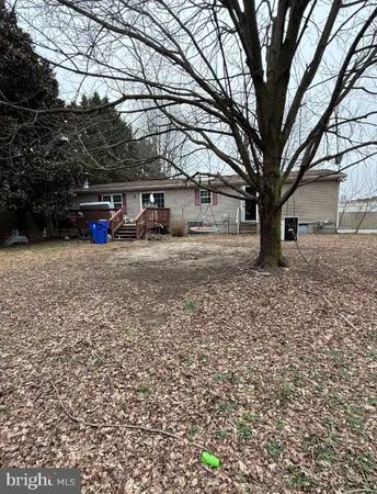 a house view with a outdoor space