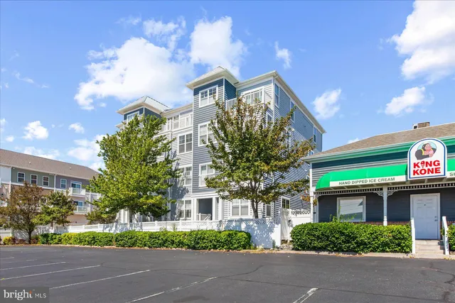 a view of a play ground in front of the house