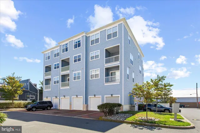 a front view of a building with street view