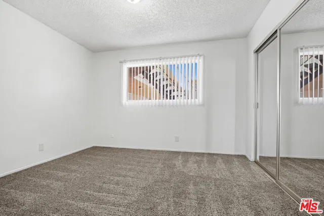 a car parked in front of a house