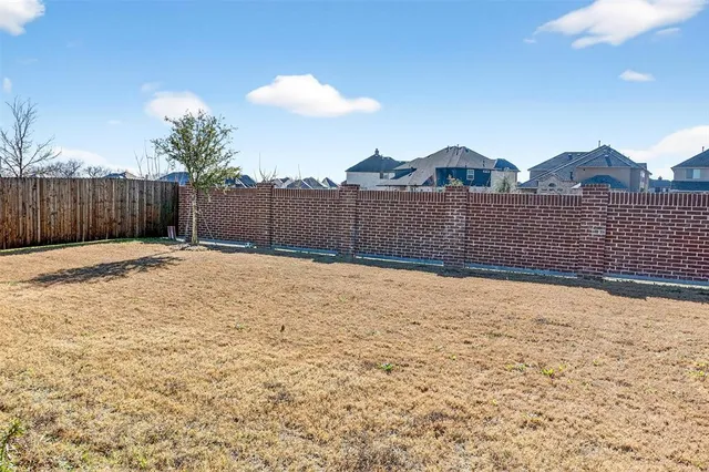 a room with a table and chairs
