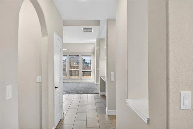 a view of a room that has a window in it