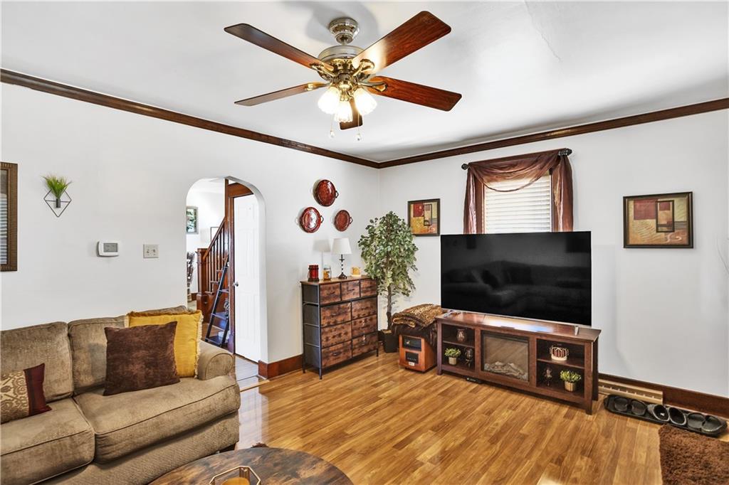 804 George Street Scottdale, PA 15683 - Photo 12 of 34 a living room with furniture and a flat screen tv