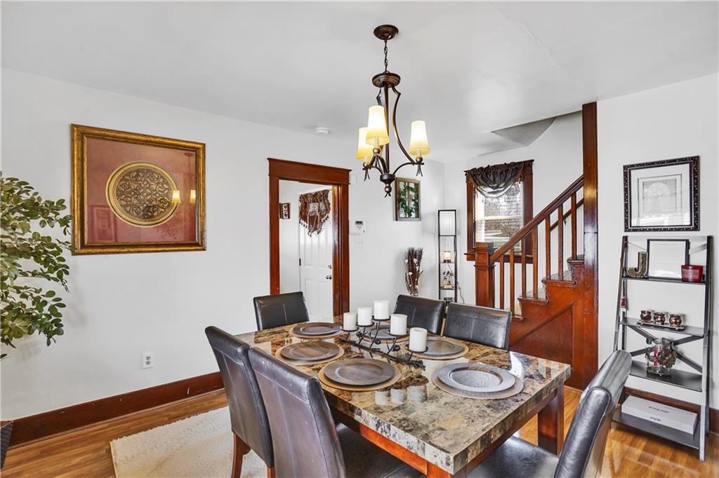804 George Street Scottdale, PA 15683 - Photo 13 of 34 a view of a dining room with furniture window and wooden floor