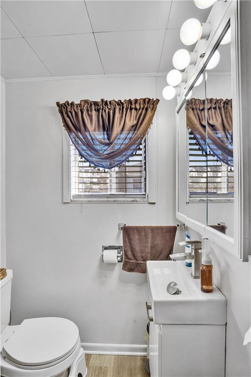 804 George Street Scottdale, PA 15683 - Photo 19 of 34 a bathroom with a sink a toilet and a mirror