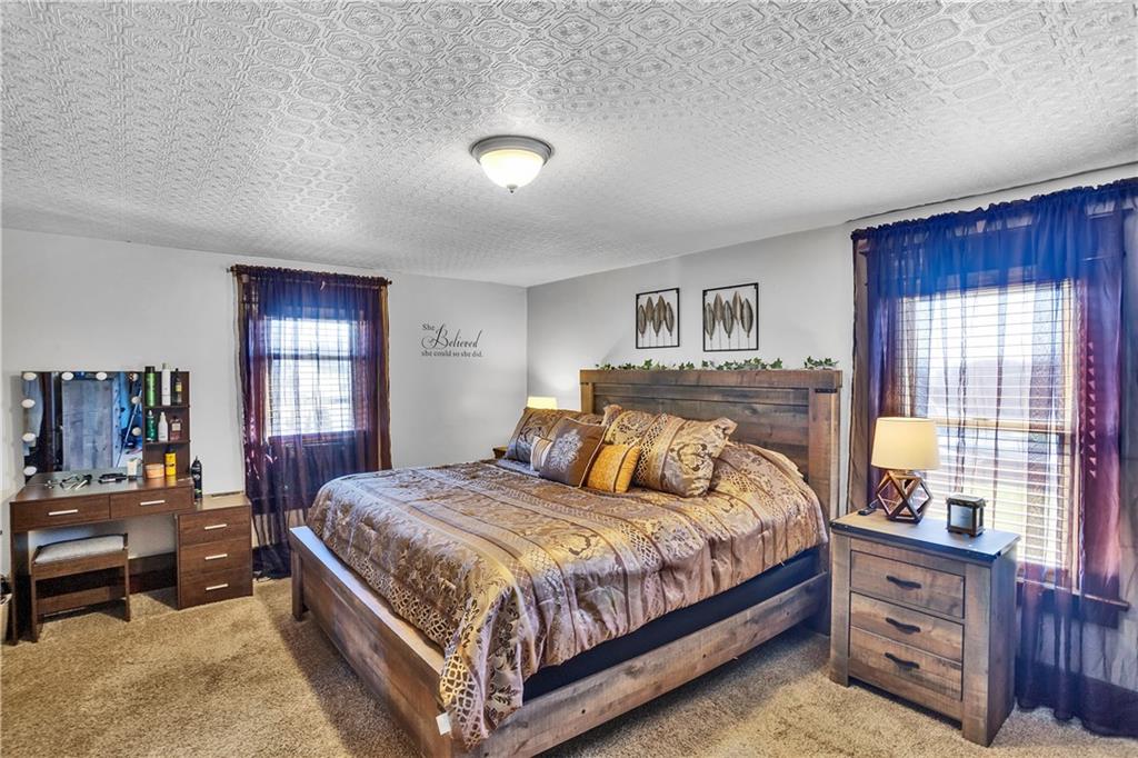 804 George Street Scottdale, PA 15683 - Photo 21 of 34 a bedroom with a large bed and a window