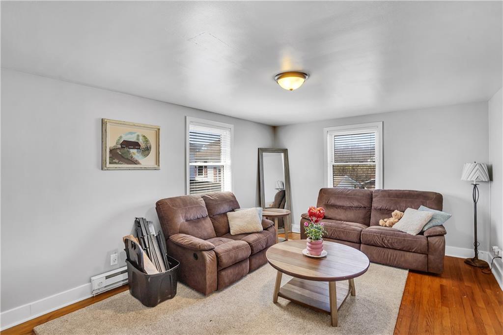 804 George Street Scottdale, PA 15683 - Photo 26 of 34 a living room with furniture and a wooden floor