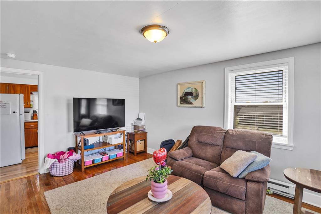 804 George Street Scottdale, PA 15683 - Photo 27 of 34 a living room with furniture and a flat screen tv