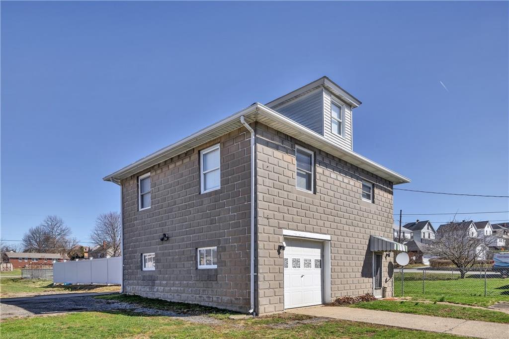 804 George Street Scottdale, PA 15683 - Photo 5 of 34 a front view of a house with garden