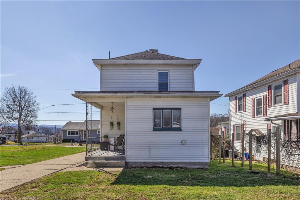 804 George Street Scottdale, PA 15683 - Photo 7 of 34 a front view of a house with a yard