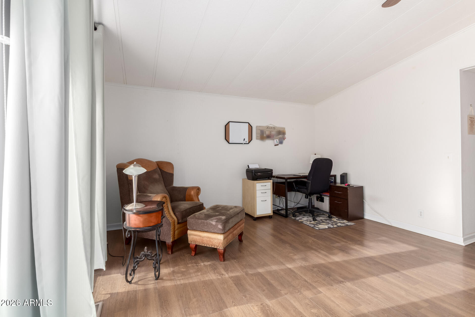 5402 East McKellips Road, Unit 186 Mesa, AZ 85215 - Photo 14 of 27 a view of a workspace with furniture