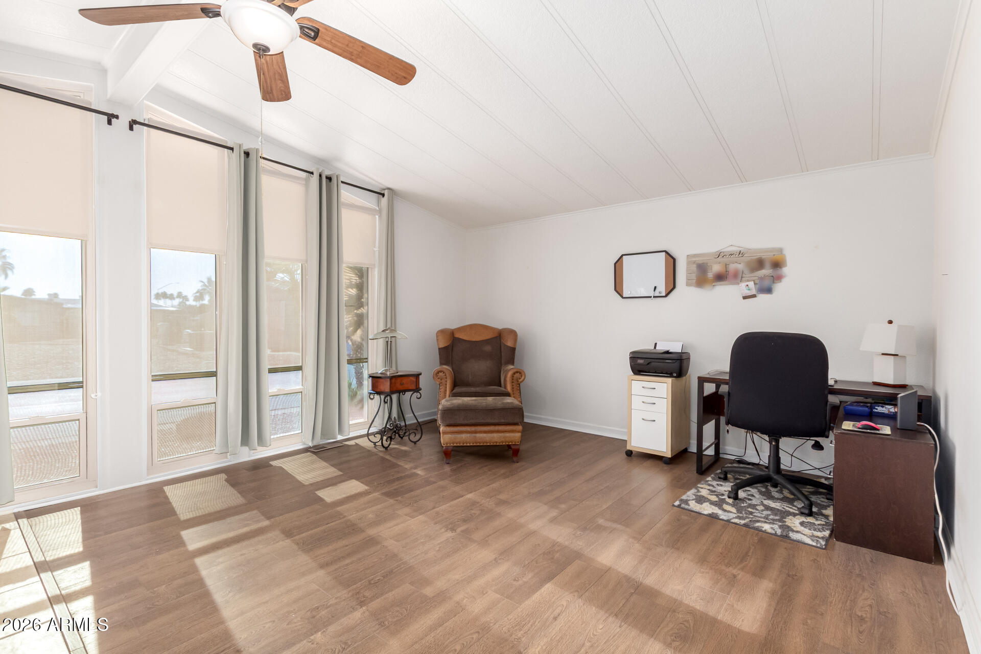 5402 East McKellips Road, Unit 186 Mesa, AZ 85215 - Photo 15 of 27 a workspace with furniture and a window