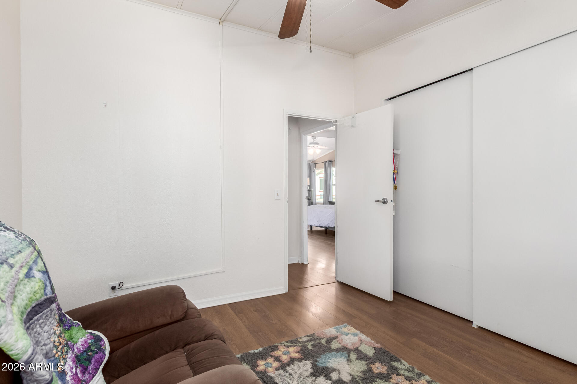 5402 East McKellips Road, Unit 186 Mesa, AZ 85215 - Photo 22 of 27 a view of livingroom with furniture and wooden floor