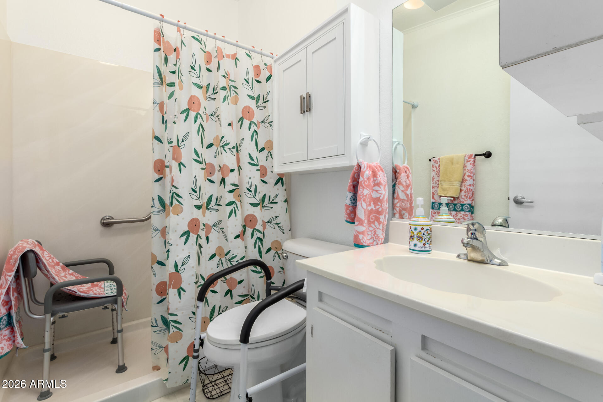 5402 East McKellips Road, Unit 186 Mesa, AZ 85215 - Photo 23 of 27 a bathroom with a sink and a mirror