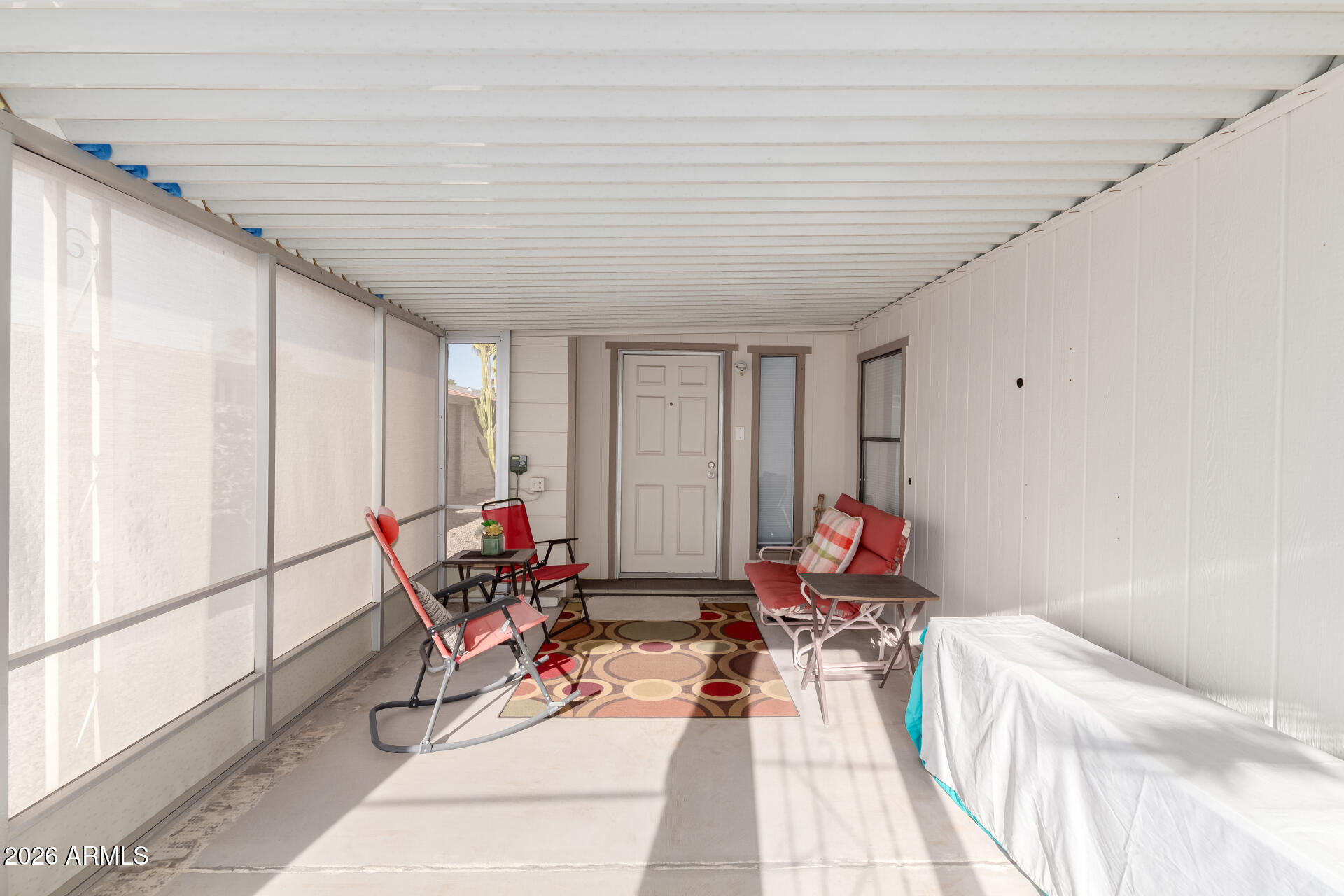 5402 East McKellips Road, Unit 186 Mesa, AZ 85215 - Photo 4 of 27 a living room with furniture and wooden floor