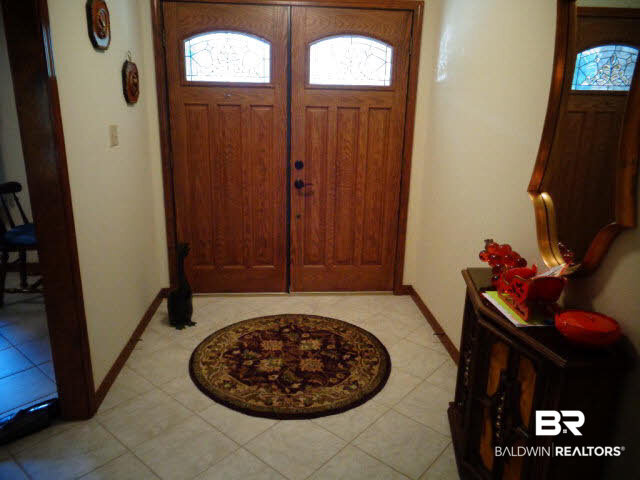 2804 Pine Ridge Drive Lillian, AL 36549 - Photo 7 of 39 14 x 06. Italian porcelain tile floor. Coat closet.