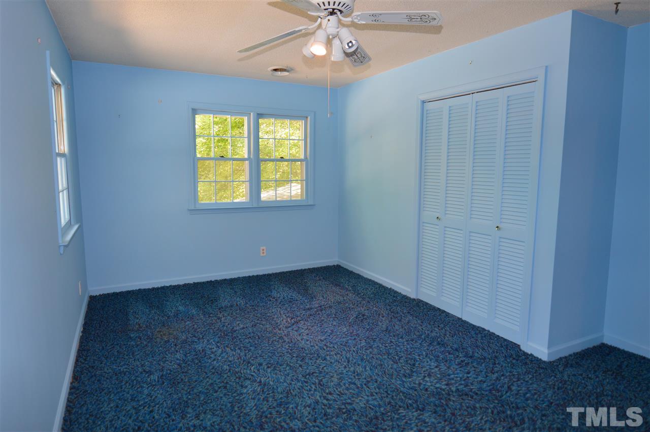 112 Bayleaf Drive Raleigh, NC 27615 - Photo 13 of 25 You guessed it!! Under this carpet there are hardwood floors.