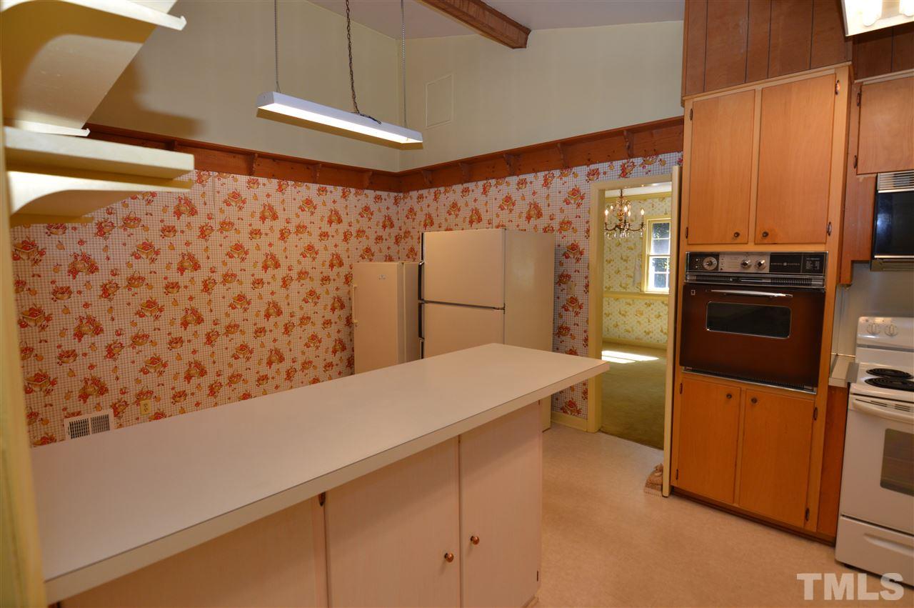 112 Bayleaf Drive Raleigh, NC 27615 - Photo 7 of 25 The kitchen is spacious can make it a wonderful eat in kitchen it has a vaulted ceiling