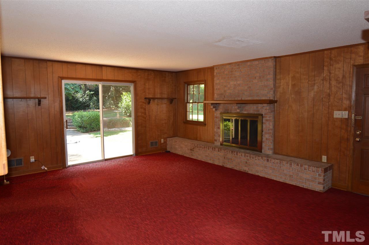 112 Bayleaf Drive Raleigh, NC 27615 - Photo 9 of 25 Hardwood floors are under this red carpet