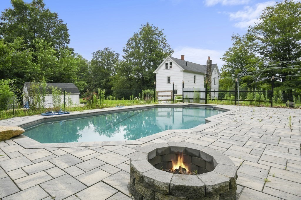 235 Manchaug Road Sutton, MA 01590 - Photo 4 of 41 a view of swimming pool with a yard