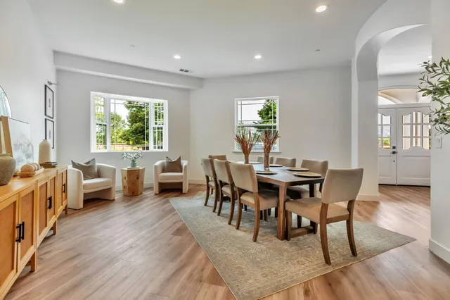 a bedroom with a bed and tv