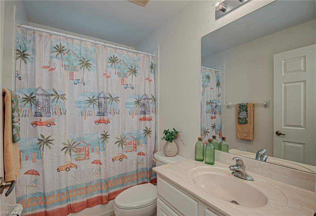 7809 Stratford Drive Naples, FL 34104 - Photo 20 of 47 a bathroom with a sink toilet and shower
