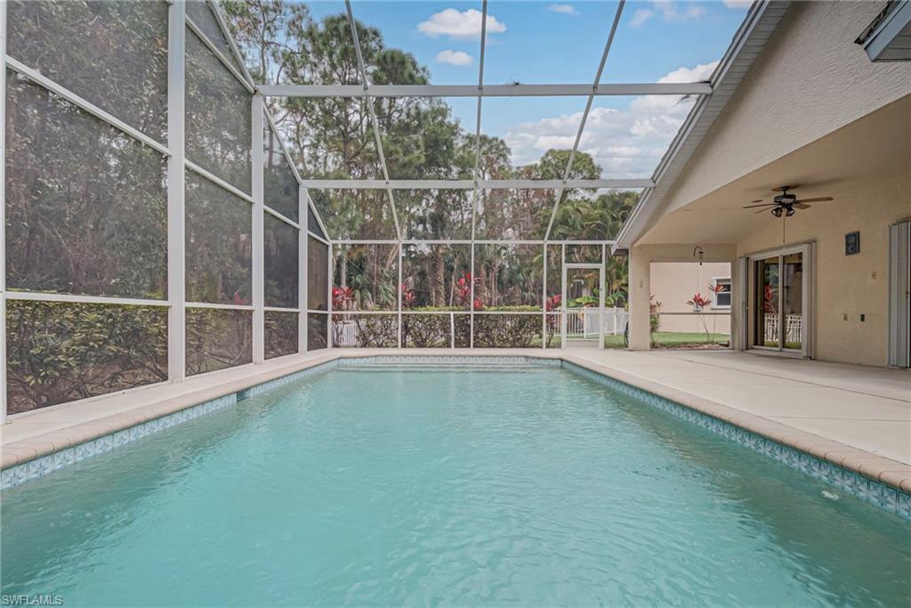 7809 Stratford Drive Naples, FL 34104 - Photo 23 of 47 a view of an empty room with a window