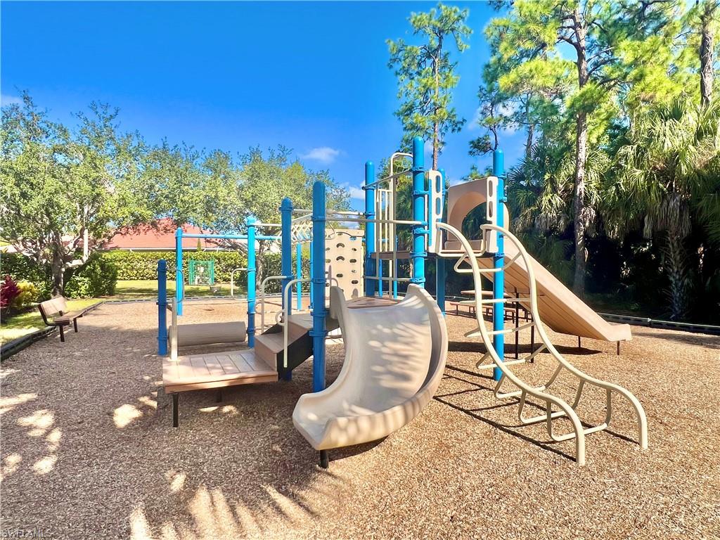 7809 Stratford Drive Naples, FL 34104 - Photo 34 of 47 a view of a chairs and table in backyard