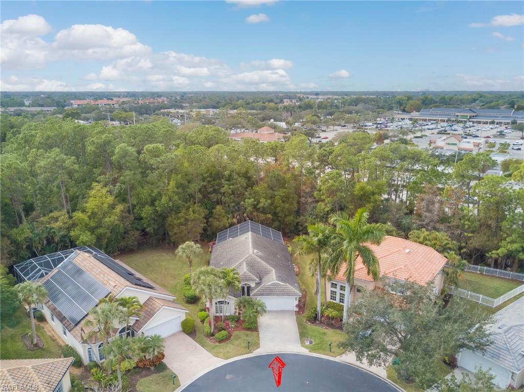 7809 Stratford Drive Naples, FL 34104 - Photo 44 of 47 an aerial view of a house with a garden