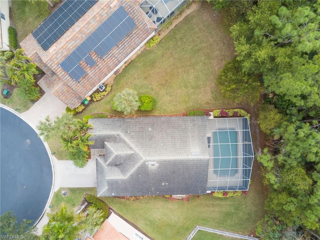 7809 Stratford Drive Naples, FL 34104 - Photo 45 of 47 a view of outdoor space yard and house