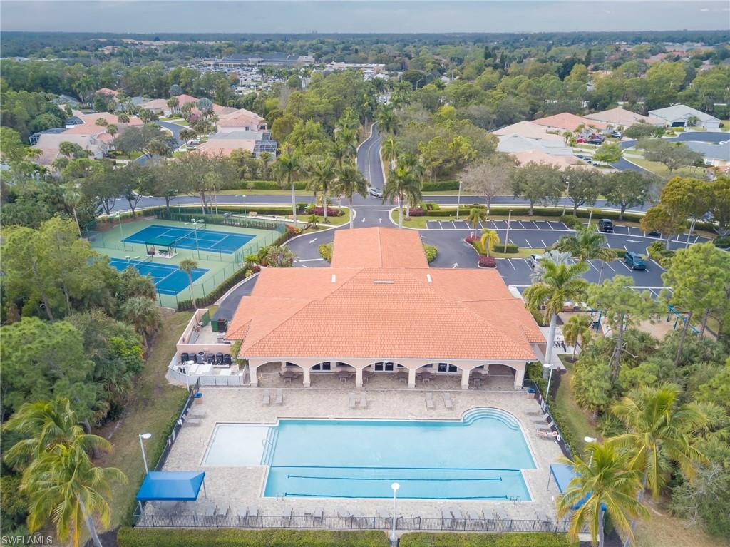 7809 Stratford Drive Naples, FL 34104 - Photo 47 of 47 an aerial view of a house with a garden and lake view